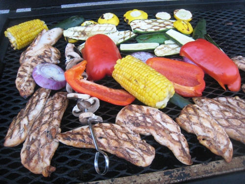 chicken and vegetables on grill