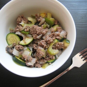 A bowl of seasoned beef and vegetables