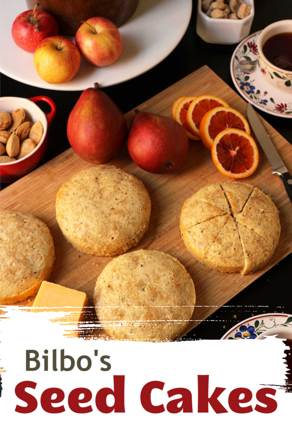 A platter of fruit, nuts, and seed cakes