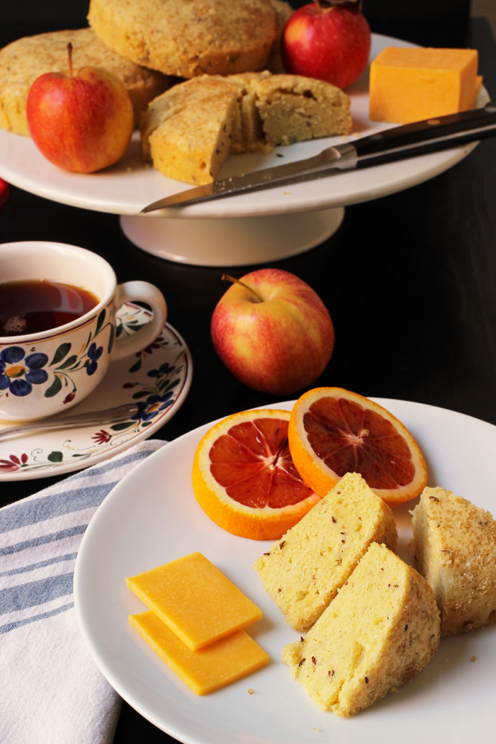 plate of treats with tea on laden tea table