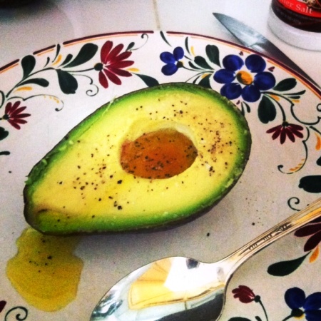 A plate of avocado with vinaigrette