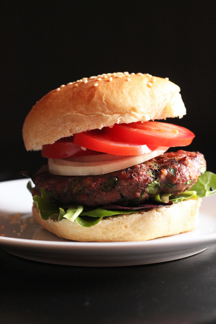 A close up of a burger on a plate