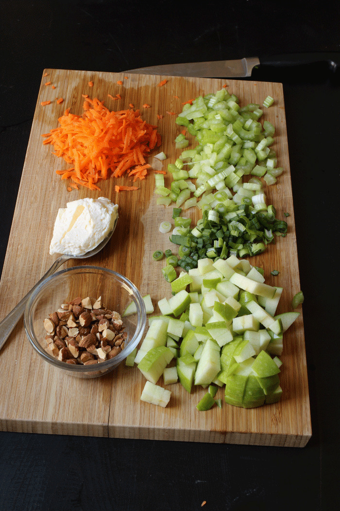 chopped mixins for chicken salad on cutting board