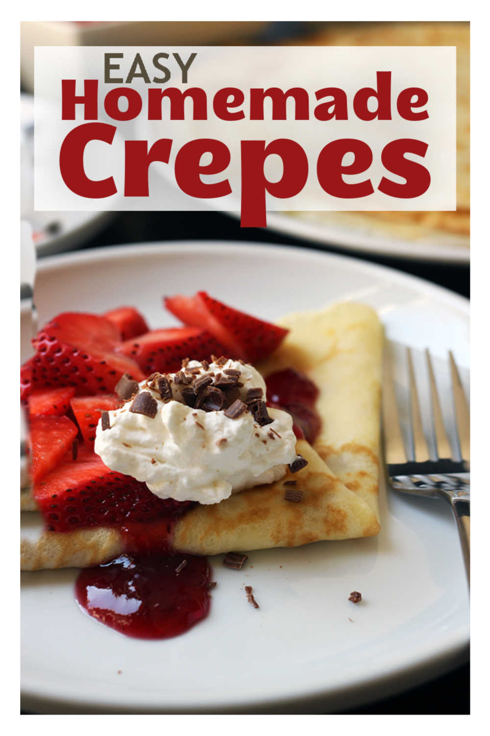 A folded crepe on a plate with cream and berries