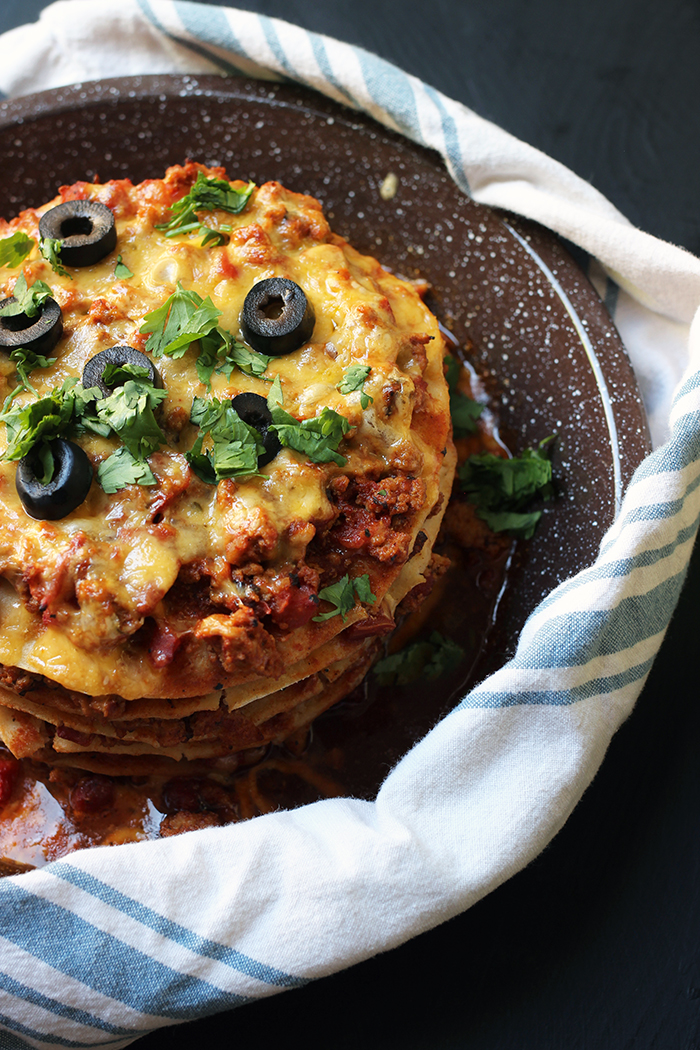 chili stacks in pie plate with blue and white towel