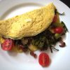 closeup of an omelet on a plate