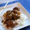 A plate of rice and meatballs