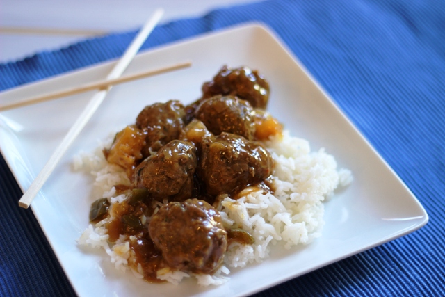 A plate of rice and meatballs