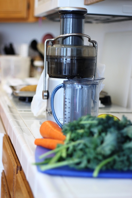 juicer on counter with fresh produce