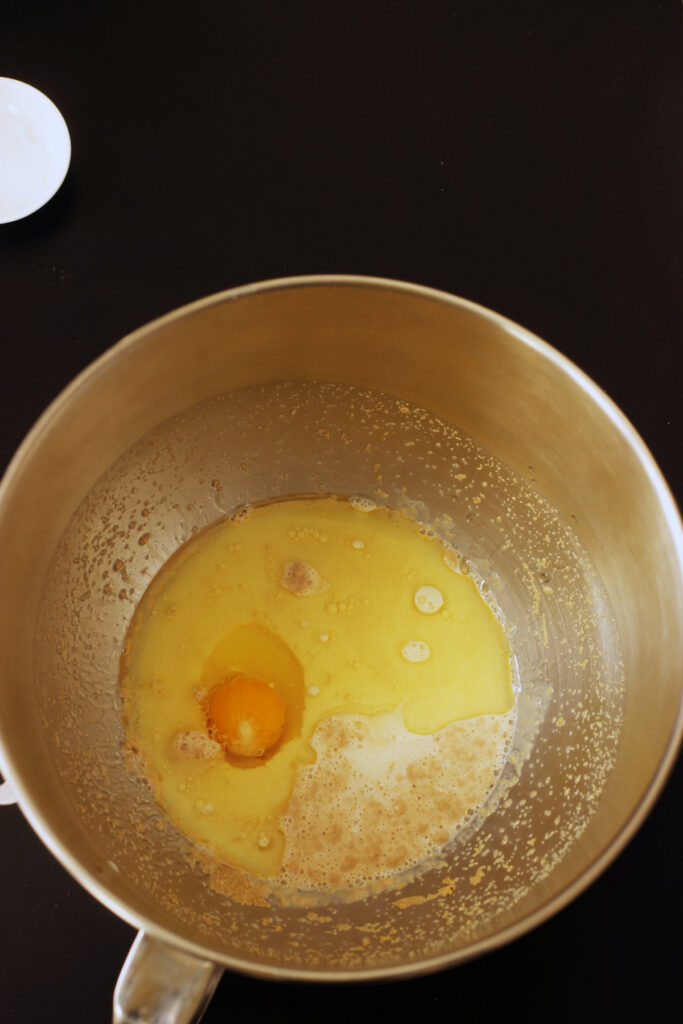 adding egg and oil to bowl