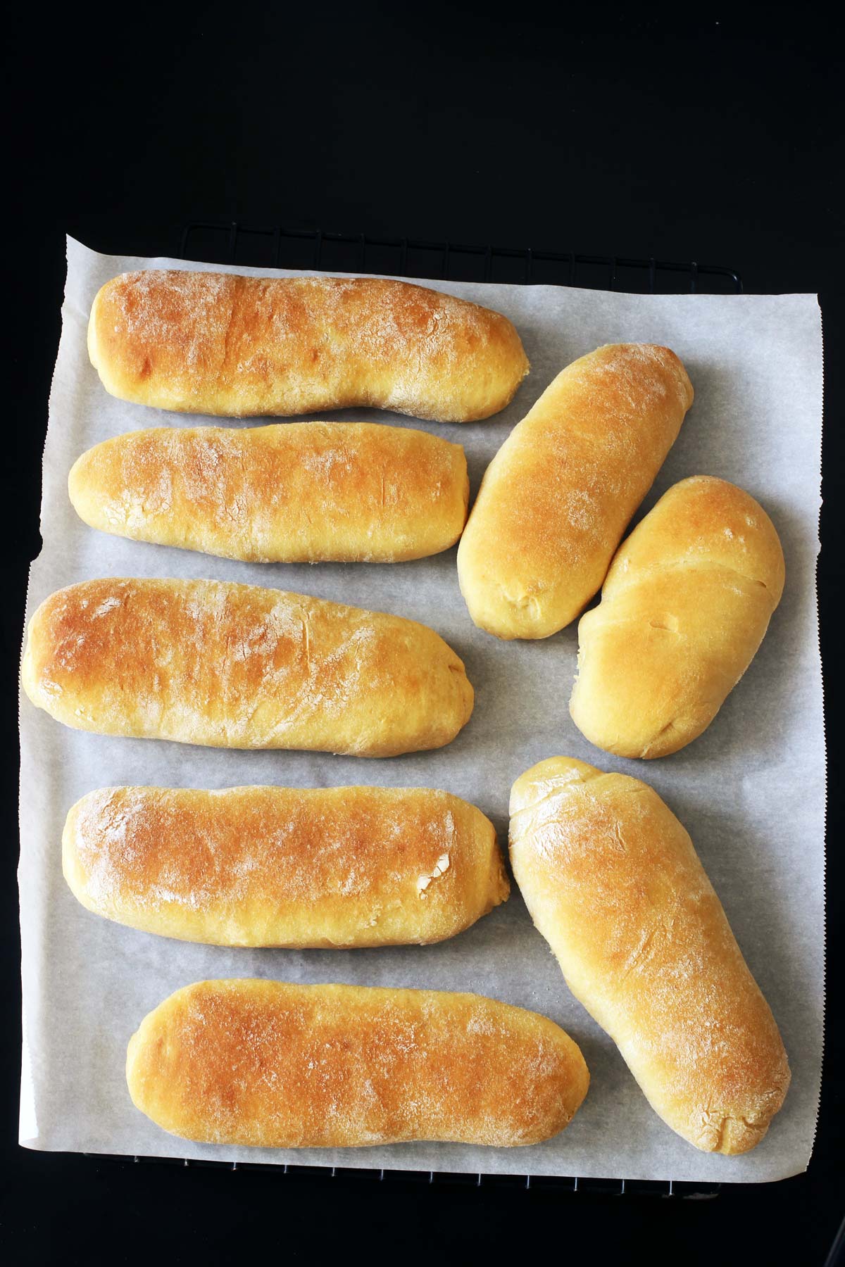 baked rolls on parchment lined tray