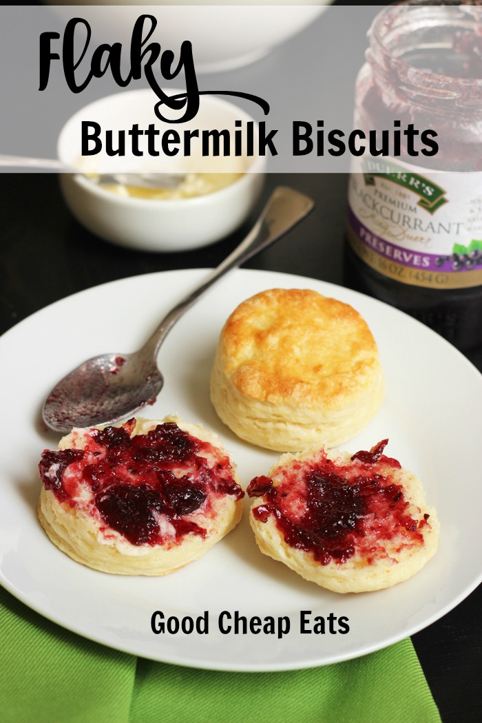 Flaky Buttermilk Biscuits on a plate with jam