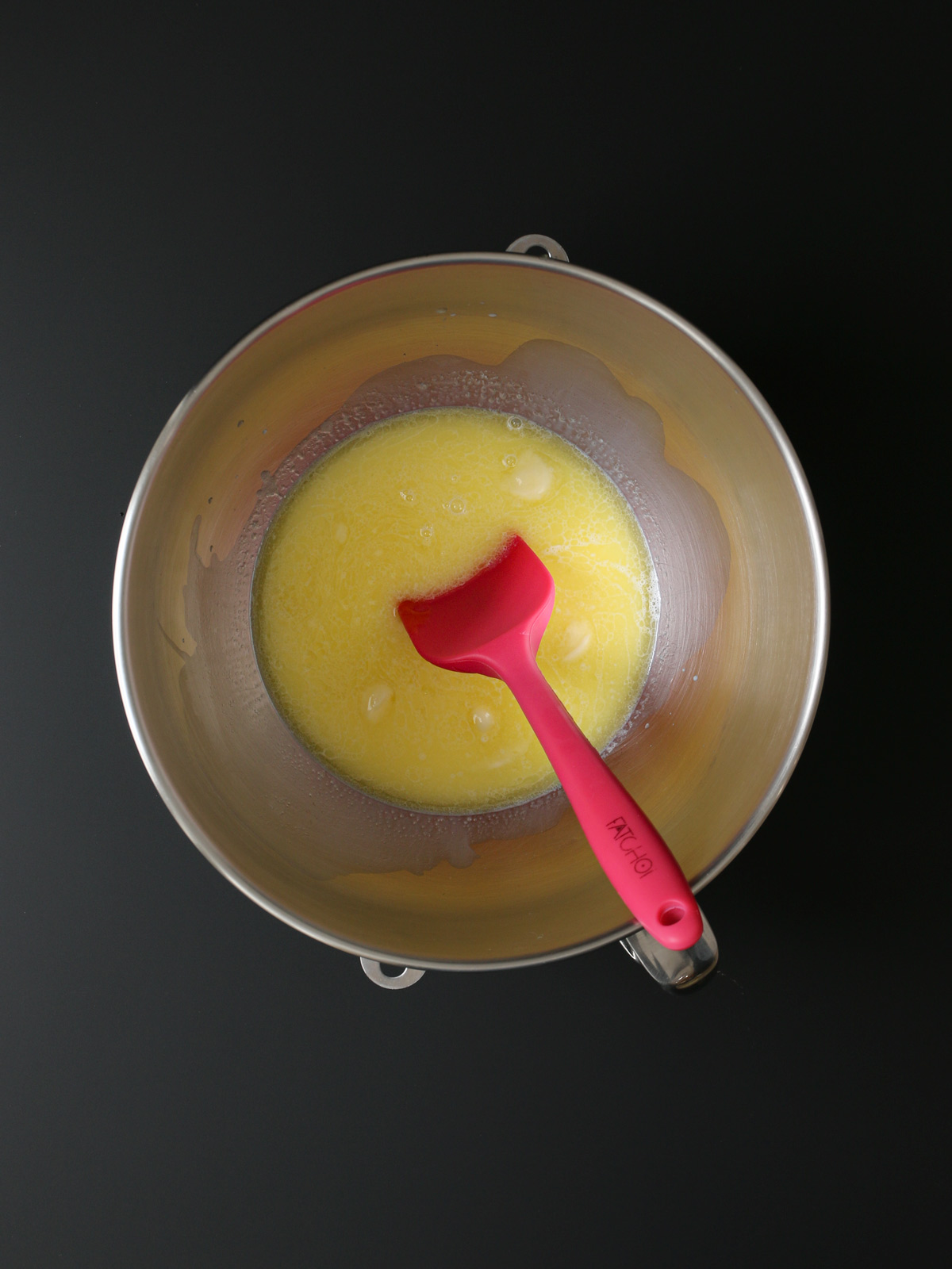 warm liquids in mixing bowl.