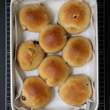 the baked rolls in the pan.