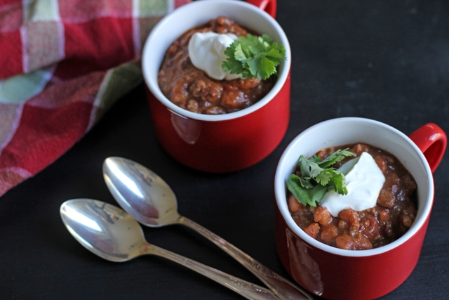 This Easy Slow Cooker Chili really is easy. Cook up meat and onions, open some cans, dump some spices, and walk away.