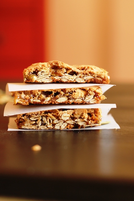 pepita bars stacked on top of a wooden table