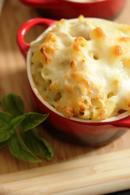 red individual ramekin of Alfredo Mac and Cheese