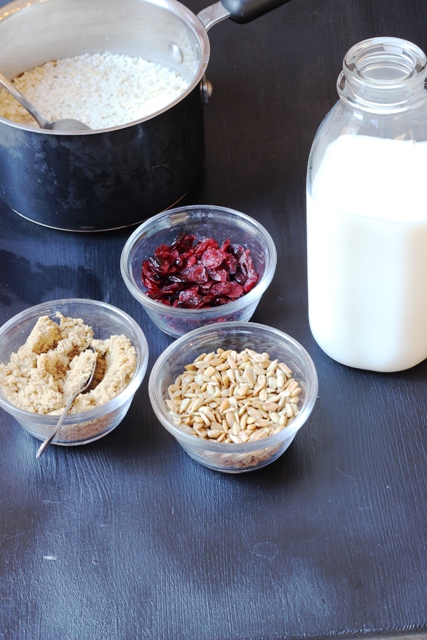 a bottle of milk with oatmeal and toppings