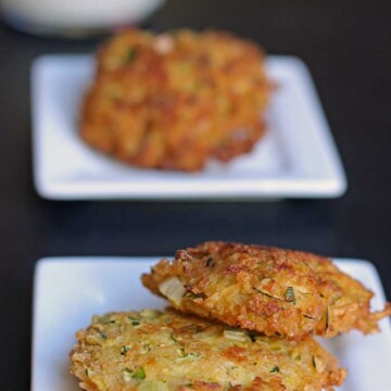 zucchini fritters on tasting plates