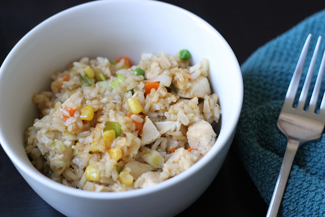 bowl of Chicken Fried Rice and a fork 