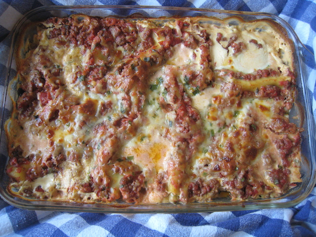 baked lasagna sitting on top of a table