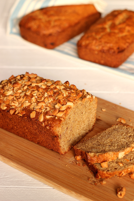 A loaf of banana bread on a cutting board