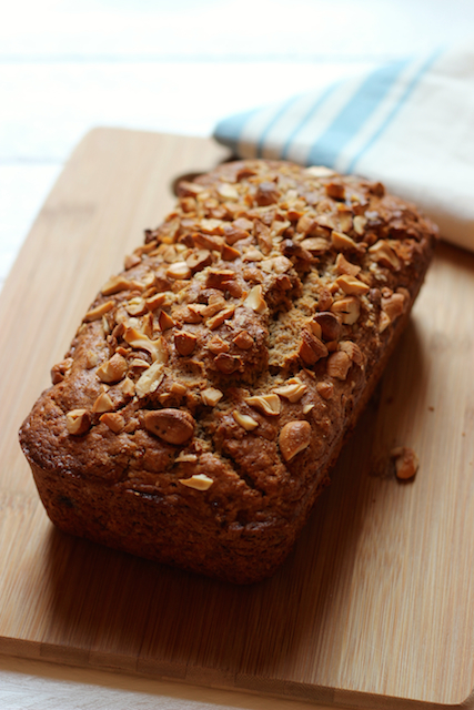 Coconut Cashew Bread on top of a wooden cutting board