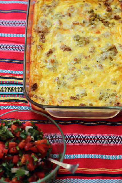 An egg bake on a table with salsa