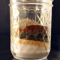 spices layered in jar for seasoned salt
