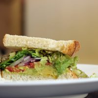 Avocado Salsa Sandwich - Layer buttery avocado with salsa ingredients on toasted bread for a sandwich that's light, yet packed with flavor. It's perfect for Meatless Monday.