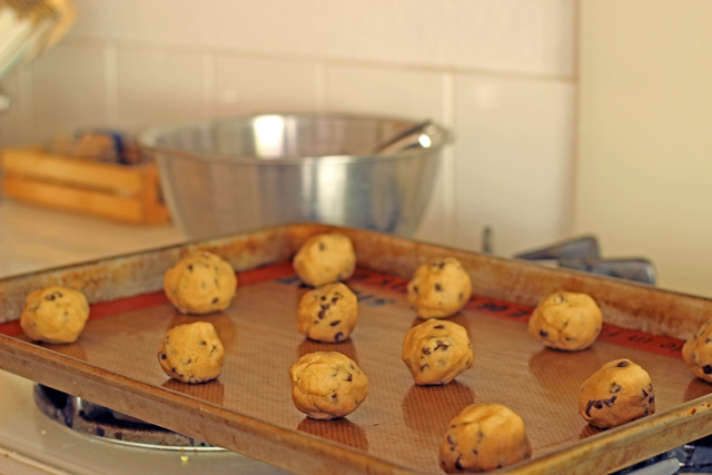 cookie balls on silicone mat on tray