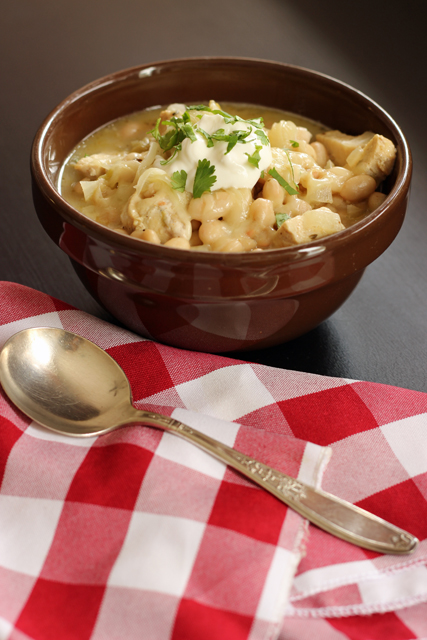 A bowl of Chicken Chili with spoon