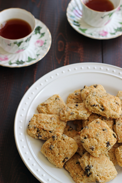 A plate of scones and a cup of tea