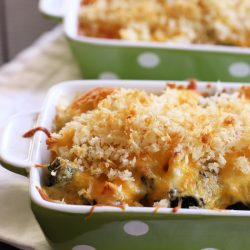 curried chicken and broccoli casserole in green dishes