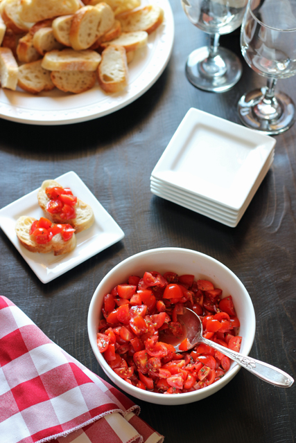 A bowl of bruschetta on a table