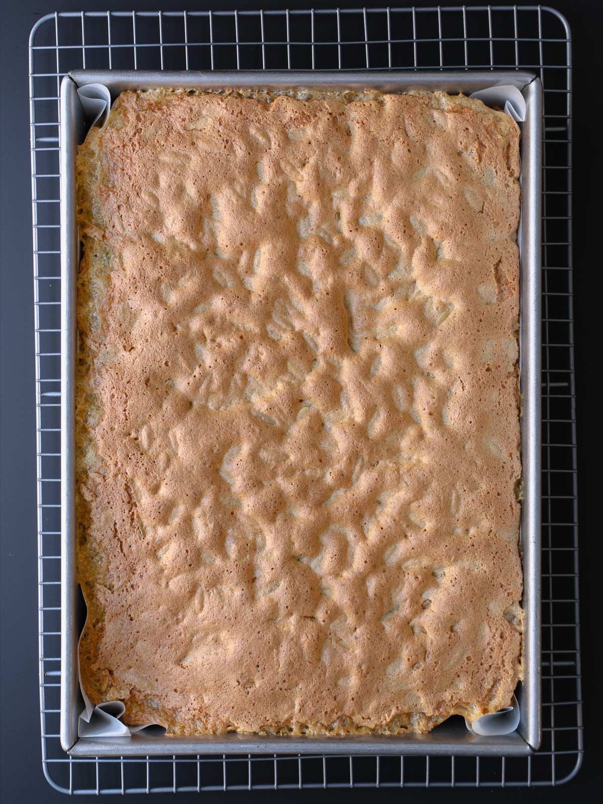 brown sugar bars baked in pan and cooling on rack.