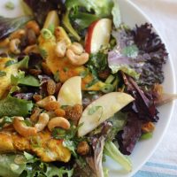 salad plate with cashews and apples