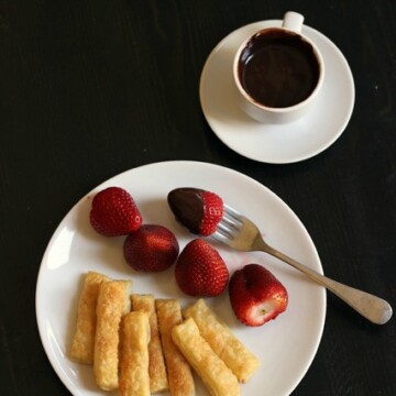 espresso cup of Chocolate Fondue with plate of fruit