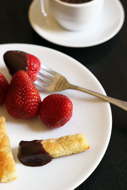 strawberries on a plate with chocolate fondue
