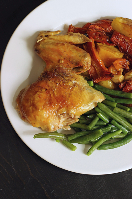 A plate of Roast chicken, with vegetables