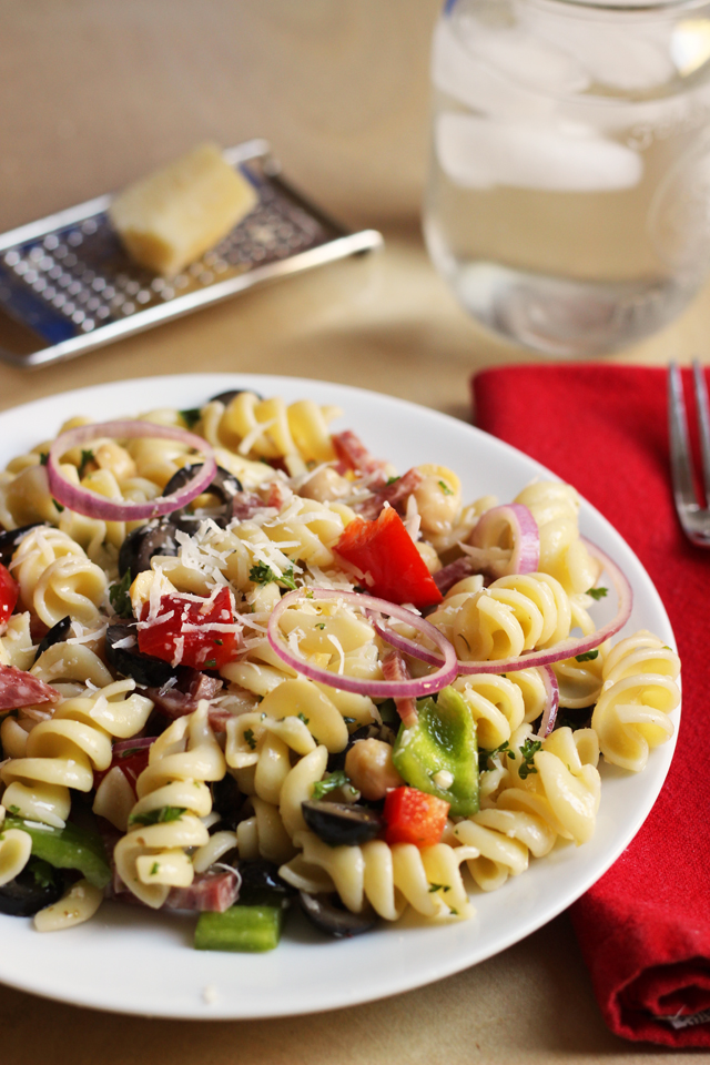 A plate of pasta salad with parmesan