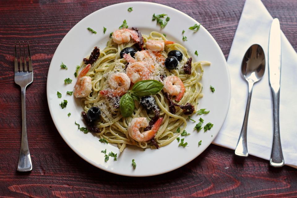 A plate of linguine and shrimp