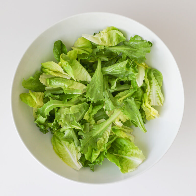 lettuce dressed with vinaigrette.