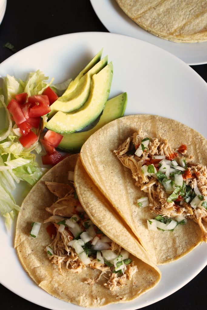 two Chicken Street Tacos on a plate