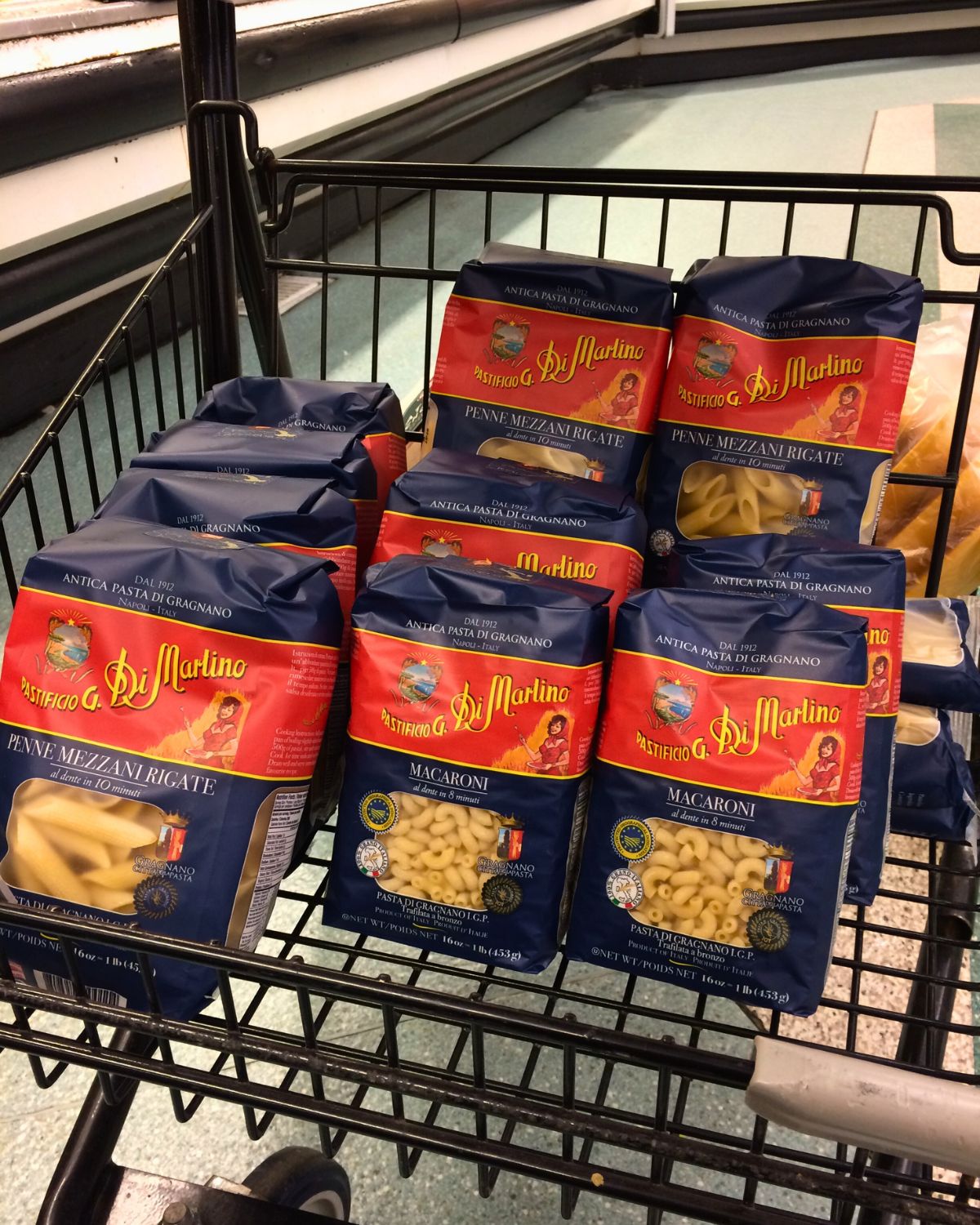 array of imported pasta in grocery cart.