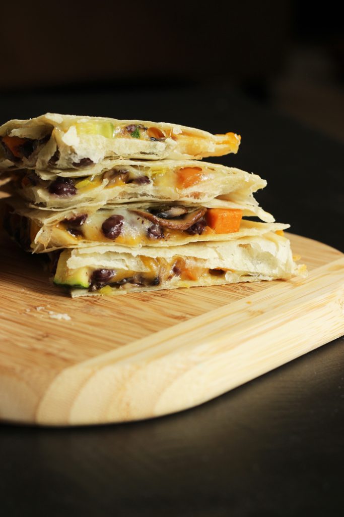 stack of quesadillas with sweet potato and black bean