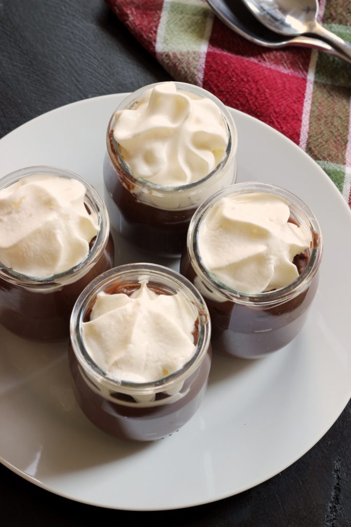 A platter of chocolate pudding cups