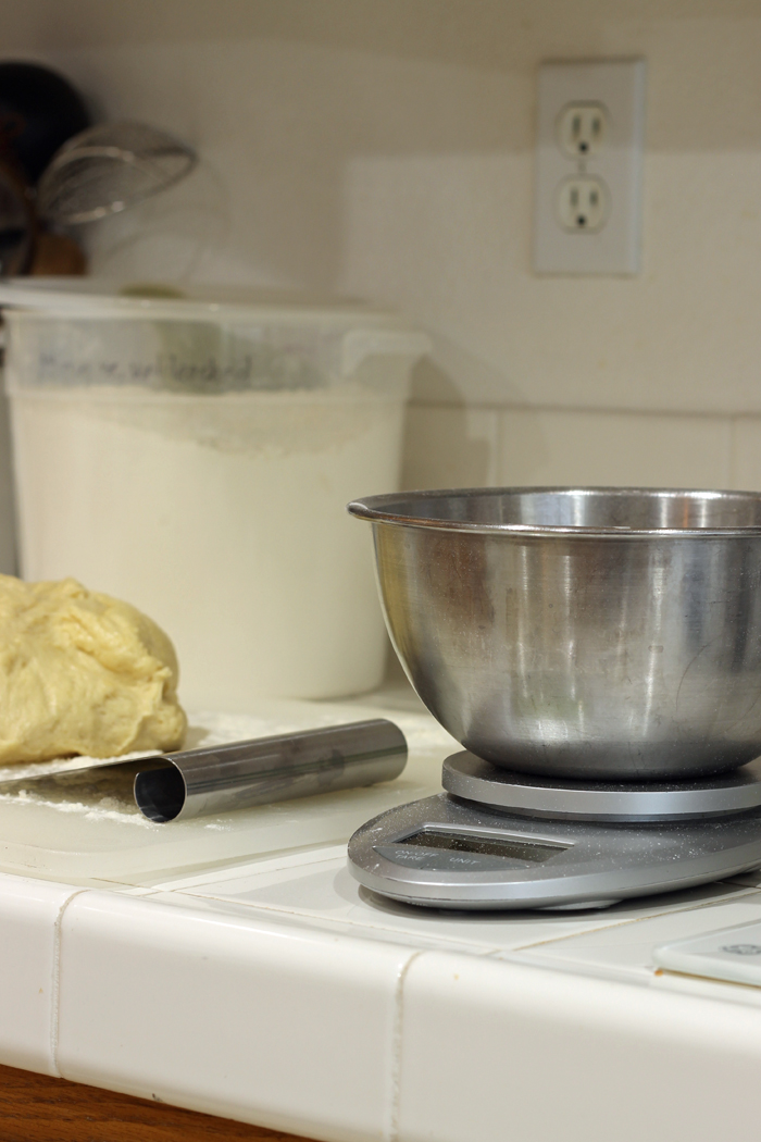 baking tools and food scale on kitchen counter