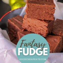 stack of fudge in a paper lined tin, with text overlay.