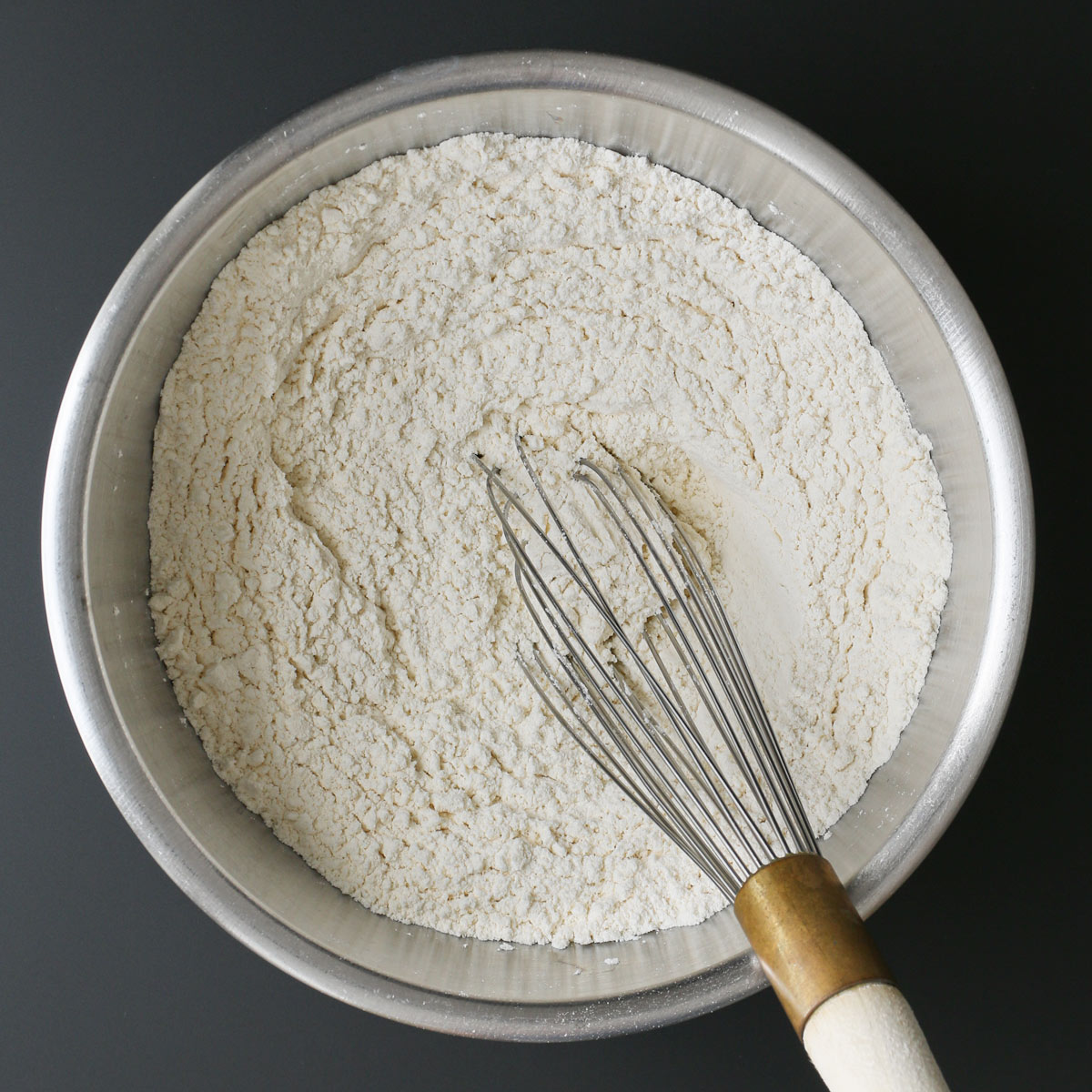 dry ingredients whisked together in mixing bowl, with whisk.